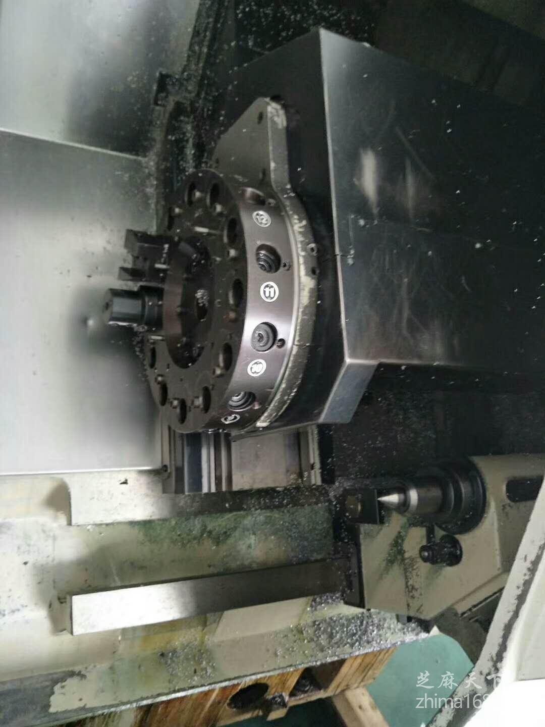 腾信精密申请车铣磨共基准复合加工机床专利防止毛刺干扰定位精度(图1)